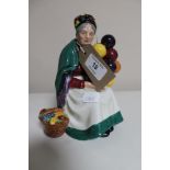 A Royal Doulton figure - The old balloon seller HN 1315