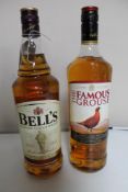 Two bottles of whisky - Bells blended scotch 1l and The famous grouse 1l.