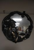 An Art Nouveau style framed mirror