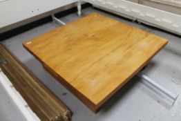 A good quality contemporary pine low table