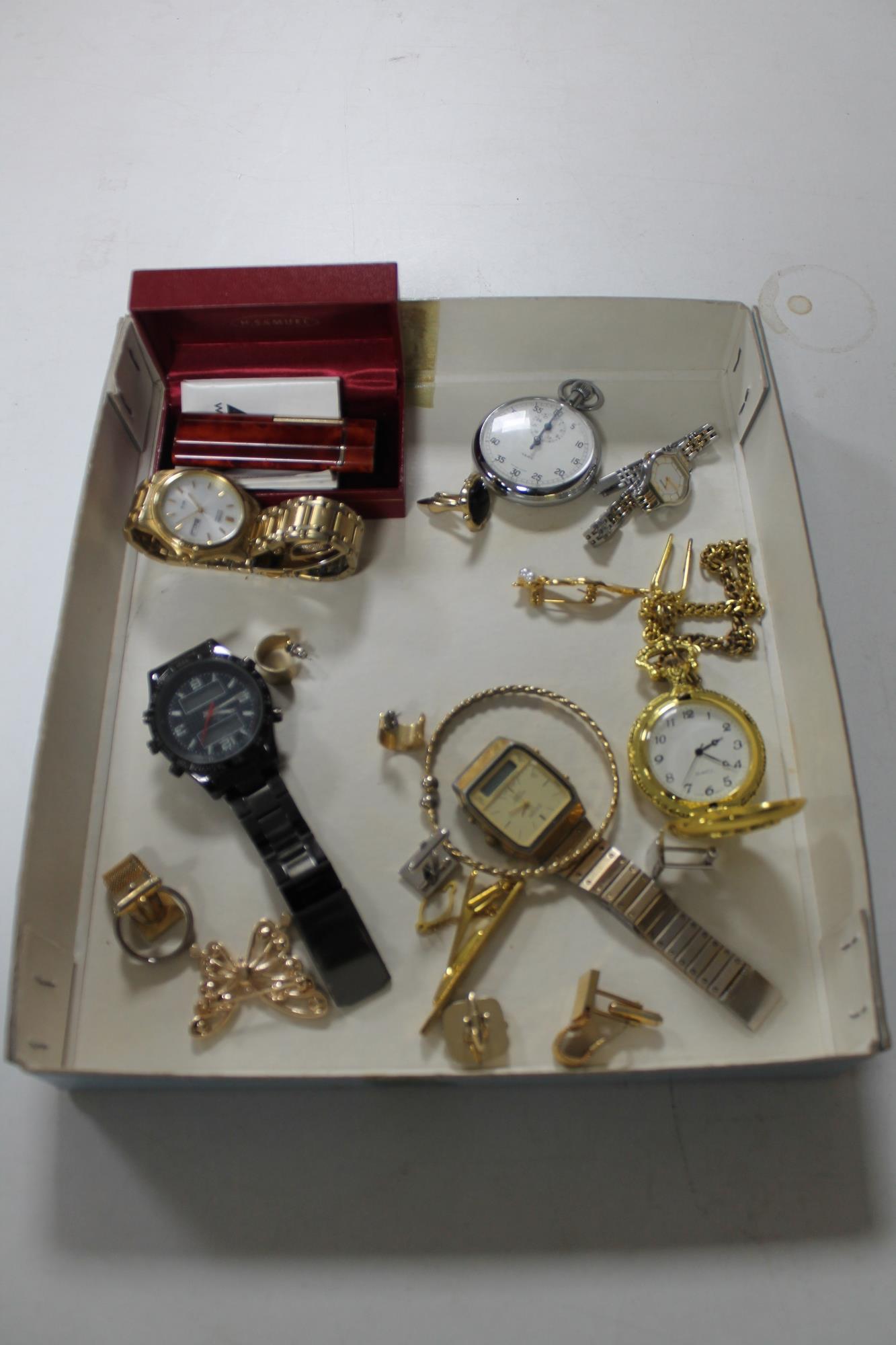 A tray of chrome park stop watch, pocket watch, three wrist watches,