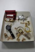 A tray of chrome park stop watch, pocket watch, three wrist watches,