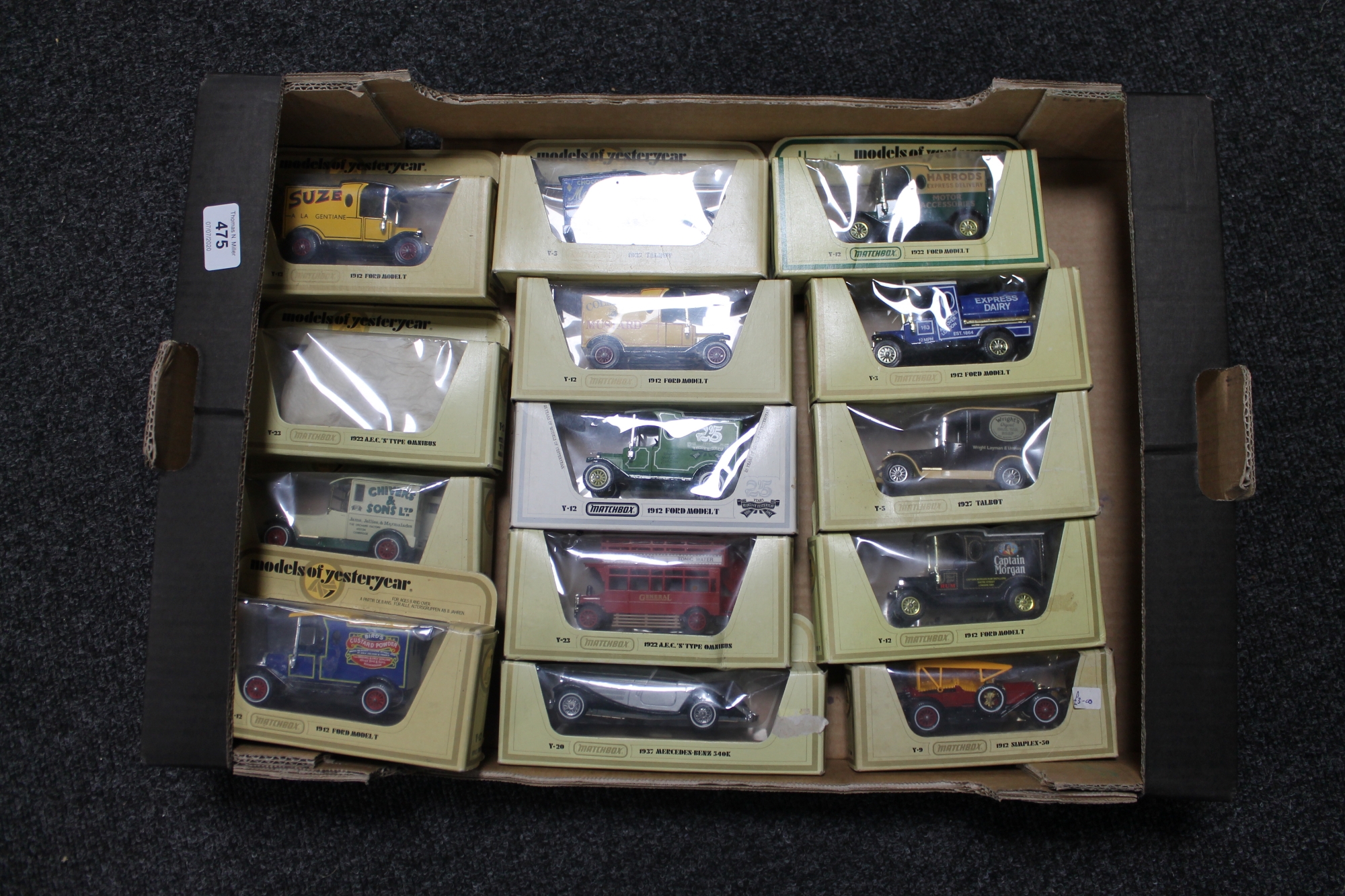 A box of die cast vehicles,