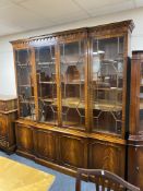 A good quality reproduction mahogany breakfronted bookcase, height 214 cm depth 38 cm width 203 cm.