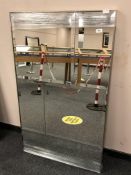 An all glass panel mirror