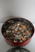 A large tin of coins