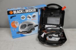 A Black and Decker electronic cleaner together with four garden animal ornaments