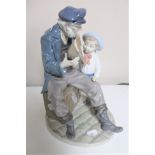 A Lladro figure - Sailor with child