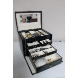 A box of costume jewellery, dress rings,