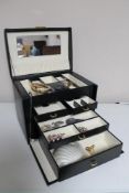 A box of costume jewellery, dress rings,