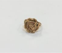 A 9ct gold ring inset with a coin, size N CONDITION REPORT: 2.