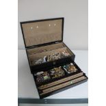 A box of costume jewellery, necklaces, beads,