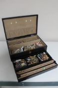 A box of costume jewellery, necklaces, beads,