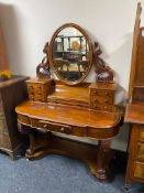 A Victorian mahogany Duchess style dressing table