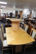 A high gloss dining room suite comprising extending table,