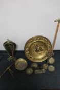 A box of brass plaques, scales,