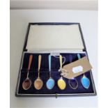 A set of six silver gilt enamelled teaspoons