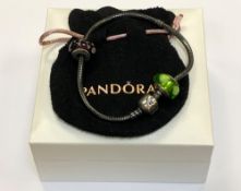 A Pandora silver charm bracelet