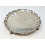 A shaped Edwardian silver tray, London 1902, diameter 26cm CONDITION REPORT: 618g.