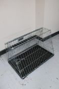 A small metal dog cage