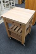 A near-new beech kitchen trolley stand with drawer