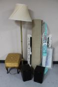 A brass standard lamp together with a roll of carpet, white framed mirror, pair of speakers, stool,
