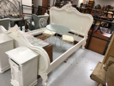 A white 5' carved cream bed frame