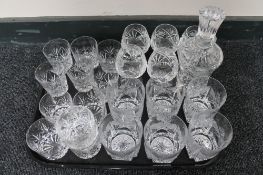 A tray of cut crystal decanter,