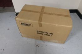 A box of BBQ grills (sealed)
