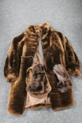 A vintage fur shawl together with faux fur coat,