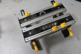 An adjustable metal saw bench