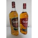 Two bottles of whisky - Grants blended scotch 70cl and 1l.