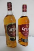 Two bottles of whisky - Grants blended scotch 70cl and 1l.