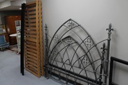 A 5' Gothic style metal bed frame