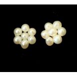 A pair of pearl cluster earrings with gold backings