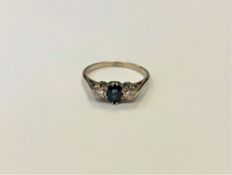 An 18ct gold sapphire and diamond ring