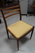 A set of four G-plan teak mid century dining chairs