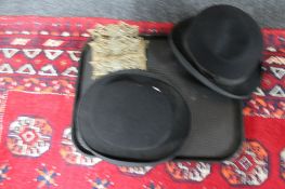 Two vintage bowler hats together with a brass embossed letter rack