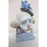 A Lladro clown head figure