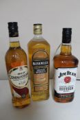 Three bottles of whisky - Jim Beam 1l, High commissioner 70cl and Bushmills Irish Honey 1l.