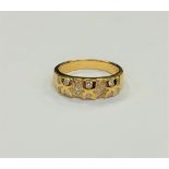 An 18ct gold diamond set ring, size L CONDITION REPORT: 4.