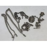 Five antique silver Albert chains,
