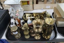 A tray of brass ornaments, miniature lamp,