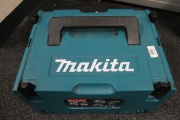 A Makita 18v cordless hammer drill with two batteries in box CONDITION REPORT: