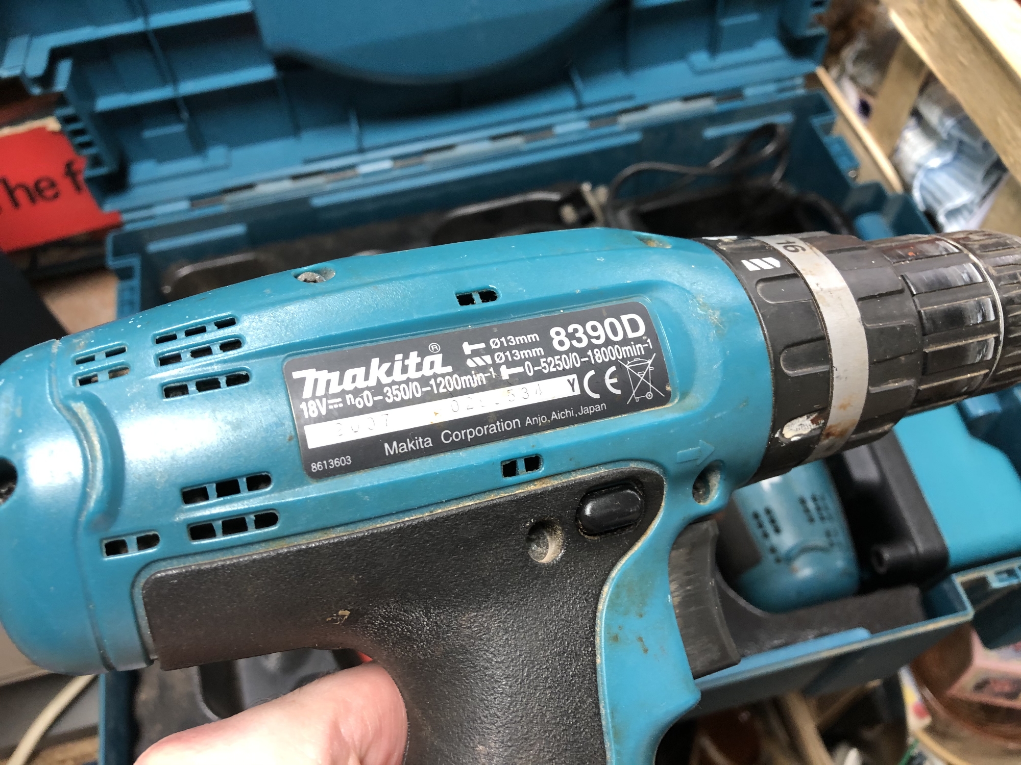 A Makita power drill in case together with a resin ornament (2) CONDITION REPORT: - Image 3 of 3