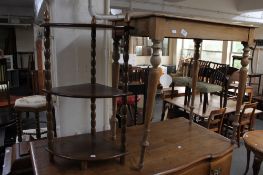 A light oak side table and a three tier stand.