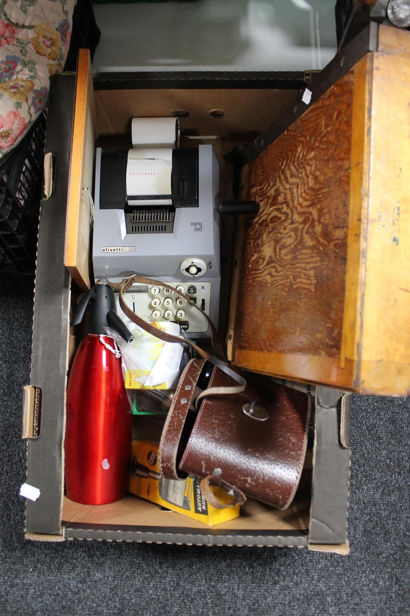 A box of binoculars in case, wooden stand,