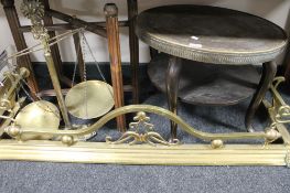 A brass topped folding table together with a folding stand,