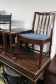 A nest of mahogany tables and a chair