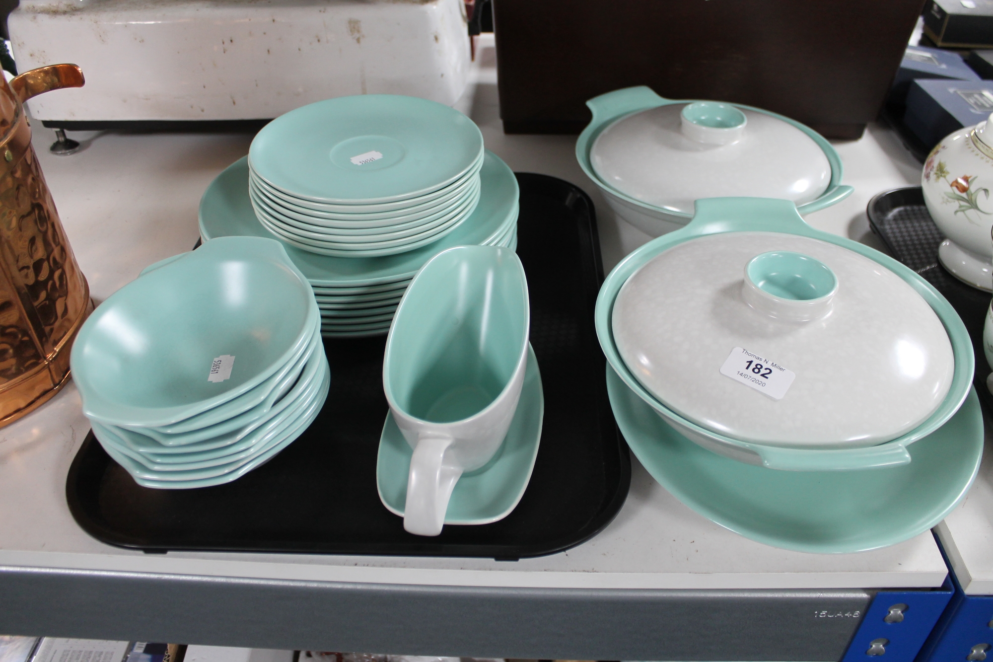 A tray of Poole turquoise dinner ware